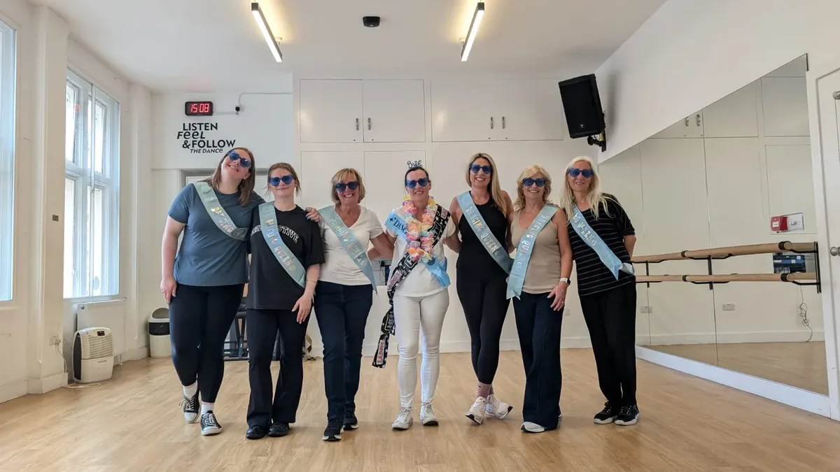 A hen group learning a noughties chart routine at a Brighton dance class