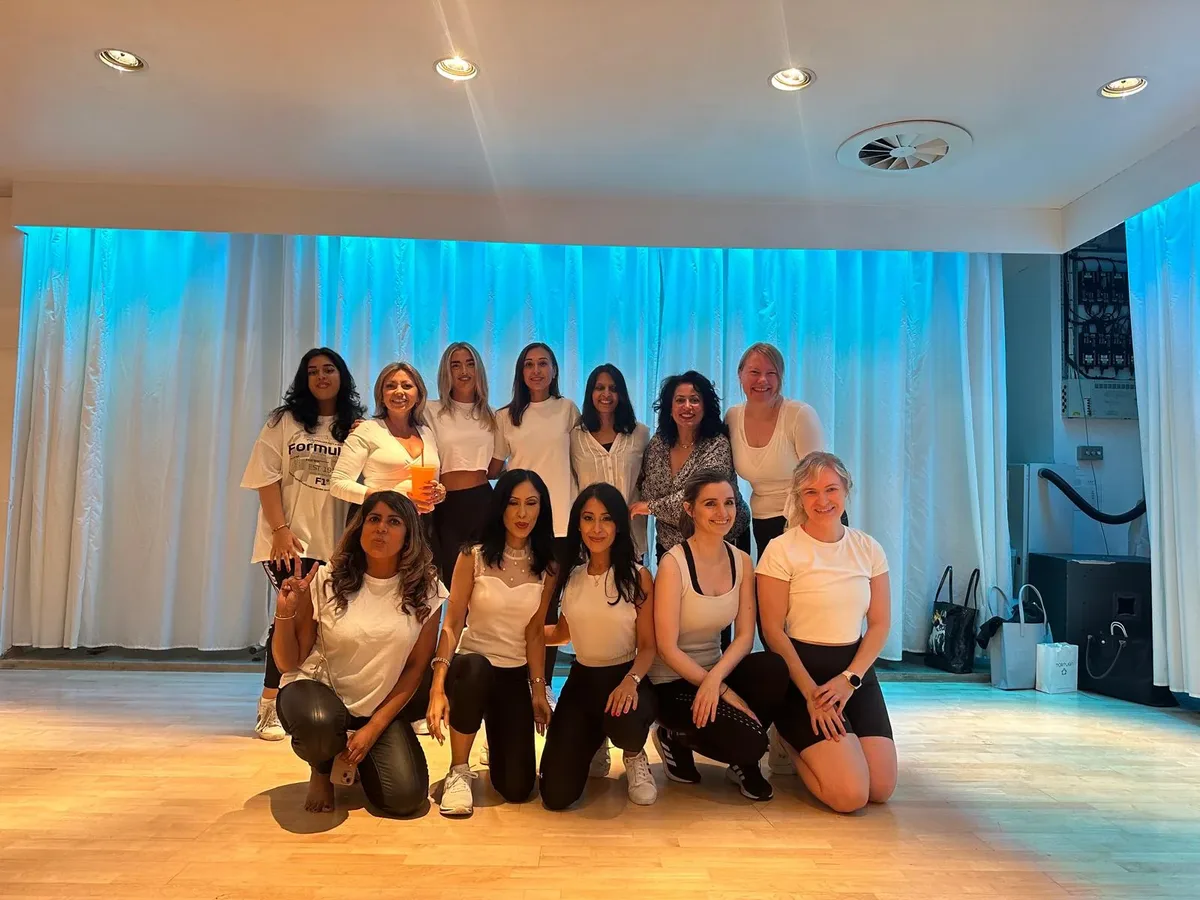A hen group celebrating after their themed dance class